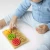 Puzzle sensoryczne kółeczka dla niemowląt 6m+ - Mom's Care